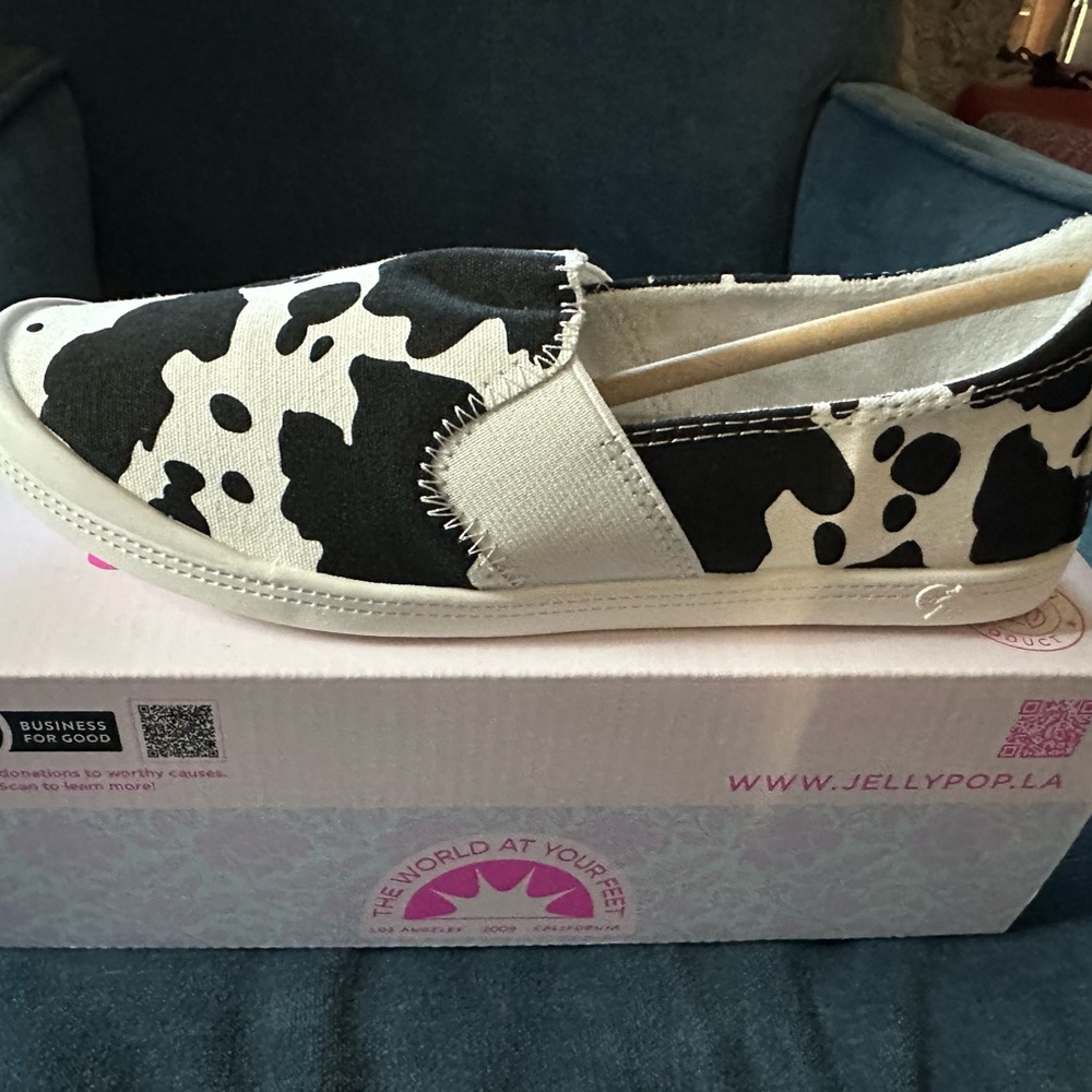 Cow print flats! Brand new!